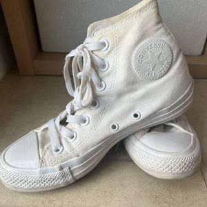 Gently used cream/white high top converse womens size 6.